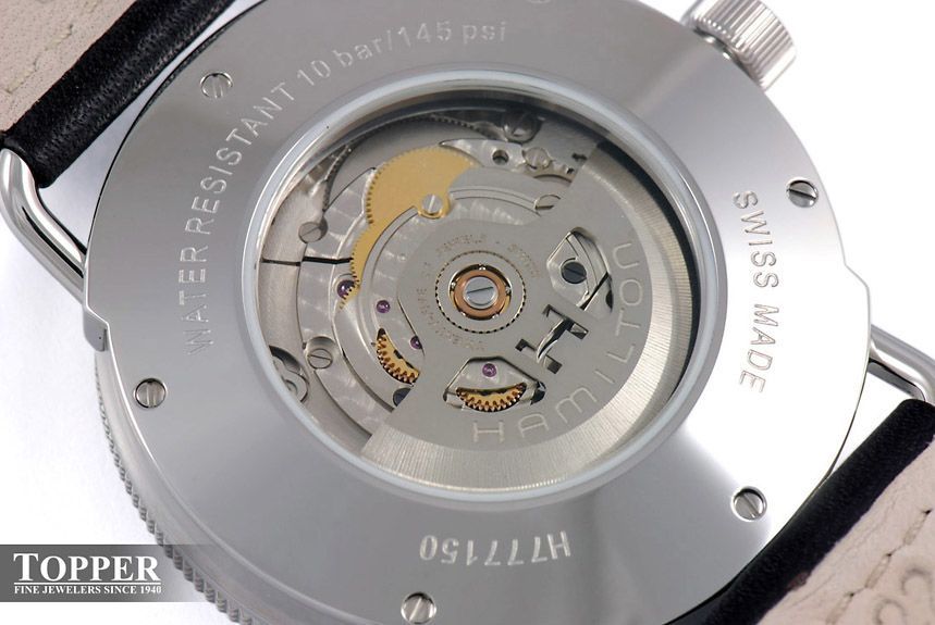 A view through the case back to the perlage on the bridges of the H-10 Calibre in the Pioneer Auto (H7771553). Note the rotor features unique skeletonization not found on Hamiltons with standard ETA movements.