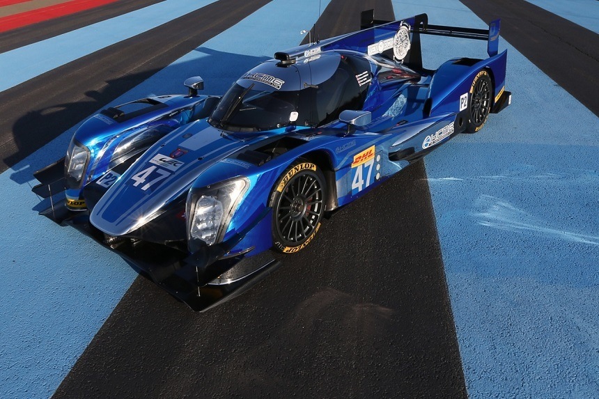 Memorigin scored a billboard-sized dorsal graphic on KCMG's LMP2 class winner - KC Motorsports Ltd.