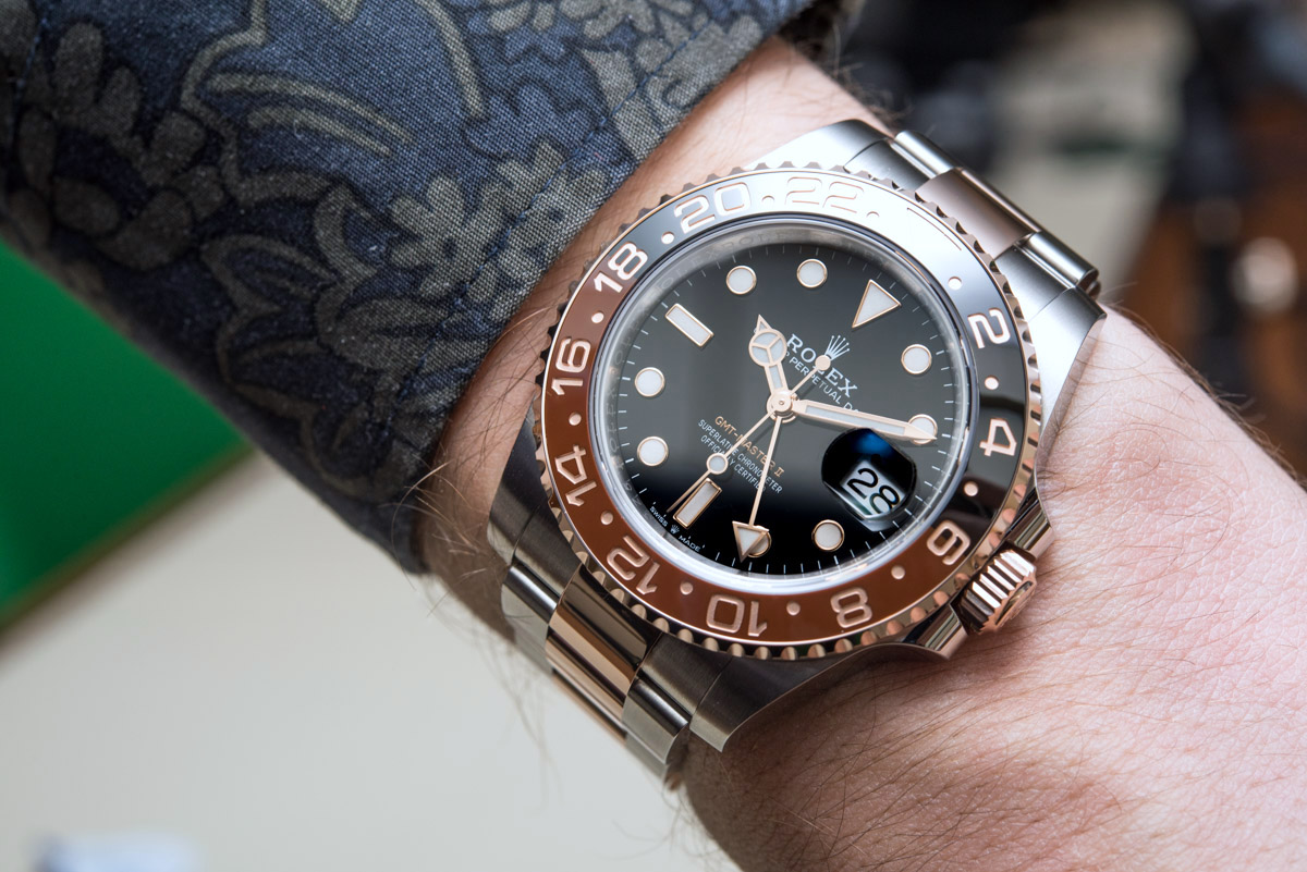 rolex gmt master ii gold wrist